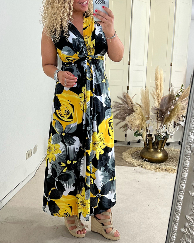 Sacha - Elegant sleeveless dress with pleated floral print