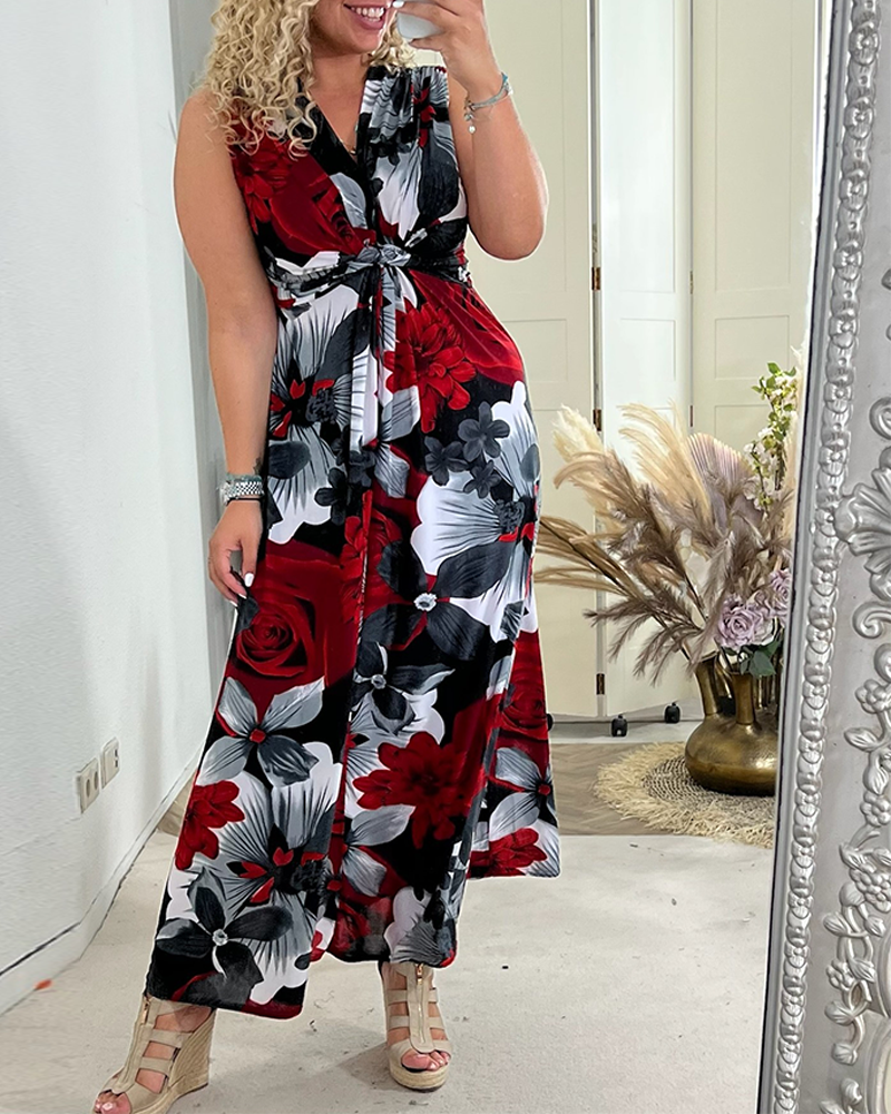Sacha - Elegant sleeveless dress with pleated floral print