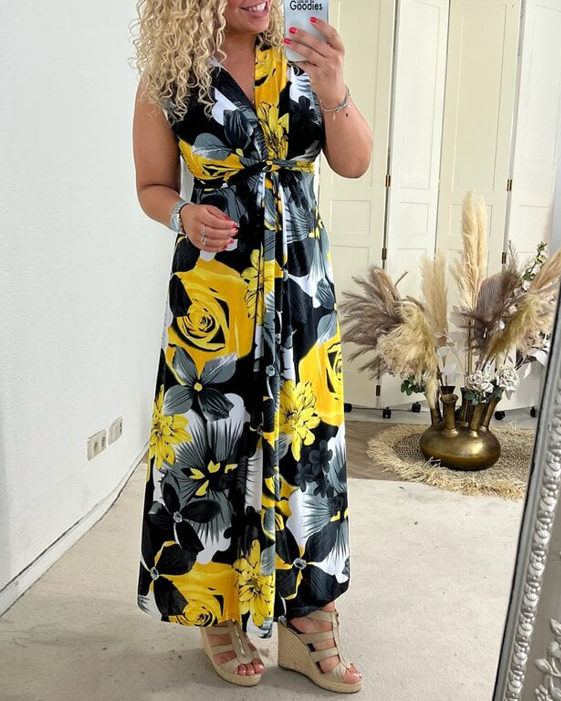 Sacha - Elegant sleeveless dress with pleated floral print
