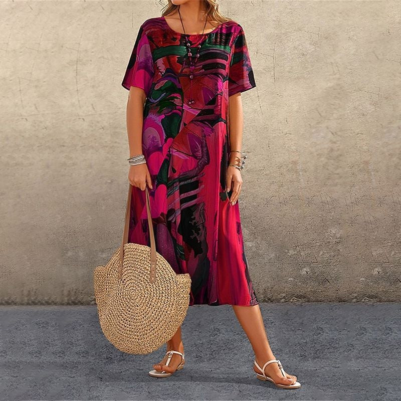 Nyelisse - Flowing dress in bright tropical colors